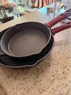 10 in & 12 in. Tramontina cast iron skillets with silicone grips