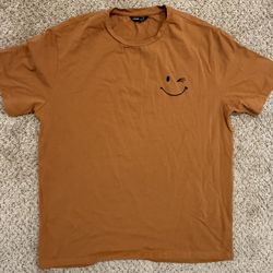 Brown Tee w/ Wink Face (Minimal Graphic)