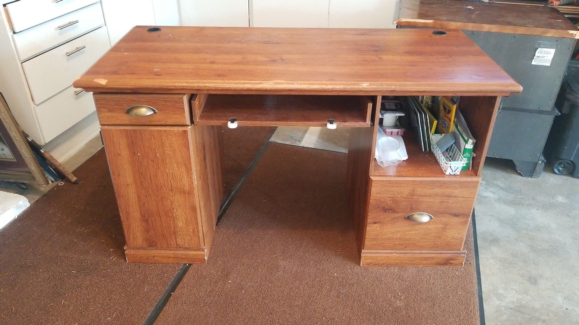 Computer desk! Just cleaned my garage and need it gone ASAP! It has scratches and some parts are loose but can be fix with screws. Pick up only!