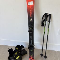Kids skis, poles, and ski boots
