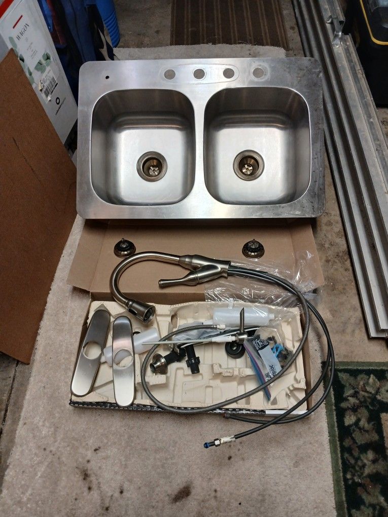 Stainless steel sink and faucet like new