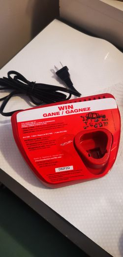Milwaukee M12 Battery Charger. BRAND NEW