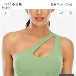 New In Packaging.  RUNNING GIRL  ONE SHOULDER SPORTS BRA SIZE SMALL.  VERY NICE.  SEE PHOTOS.  CASH/PICKUP ONLY THANKS 