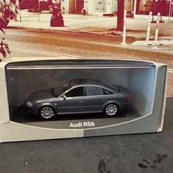 1:43 Scale Minichamps Audi RS6 Sedan Diecast Car with Display Case.
