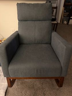 Rocking Chair with two side pockets.