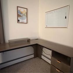 Sit to stand corner desk with power outlets and storage drawers
