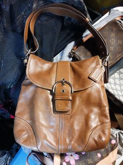 Two leather shoulder bags in great over all condition.