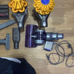 Dyson Vacuums Both Work Great But One Is Missing Charger  