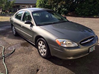 2003 ford low mileage clean title- seats 6