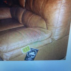 New W/2 TAGS LEATHER LOVESEAT, TAN COLOR, ORANGE TINT 38"DEPTH
