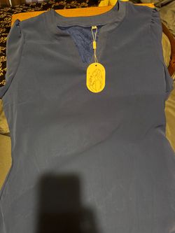 Woman’s blue shirt, dress blouse