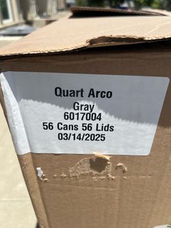 Empty quart metal cans
