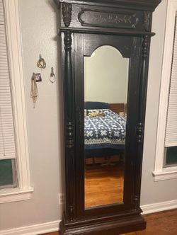 Full length mirror with jewelry storage
