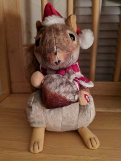 Gemmy toys Christmas singing dancing squirrel. Sings "I'm gettin nuttin for Christmas". Cute as a button battery operated.