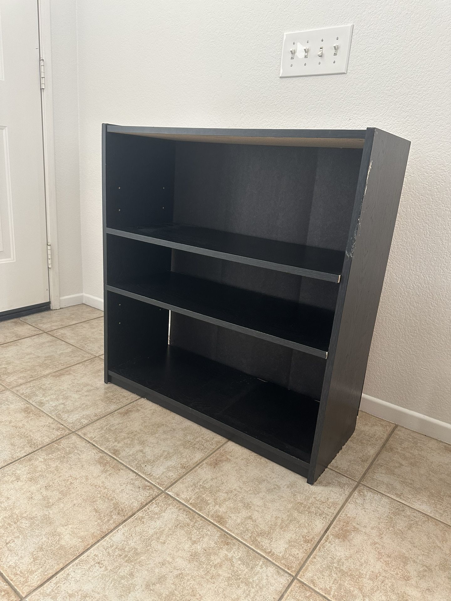 Black Shelf Unit: 3 Shelves. Used. Particle Board.