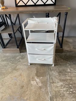 white metal-framed mobile nightstand or end table featuring two fabric storage drawers