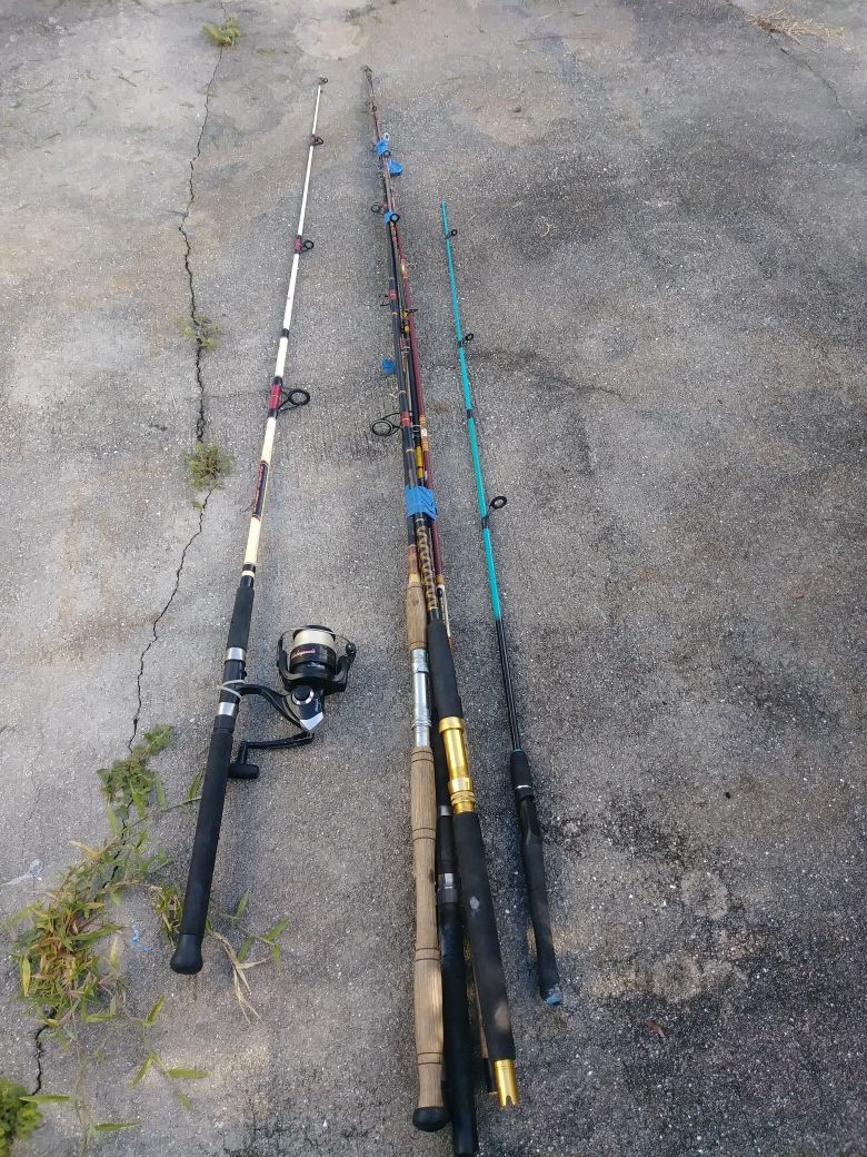 Lot of Fishing poles. 5 Rods and reel