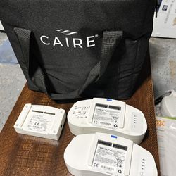 2 Caire batteries charger and cord Airsep