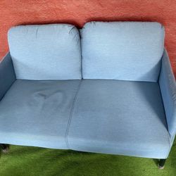 Baby Blue Sofa $380