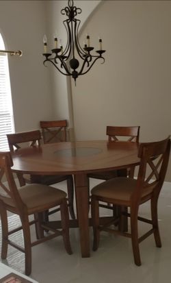 Dining room table Round and Square and 6 chairs. Lazy suzan