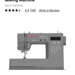 Singer Sewing Machine With Extra Sewing Accessories 