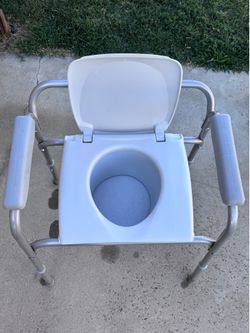 Bedside Commode With Bucket by Drive Medical.
