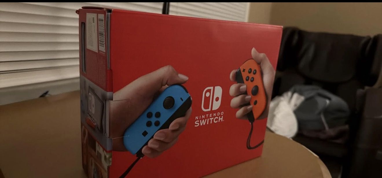 Brand New Nintendo Switch With Neon Blue and Neon Red Joy-Con