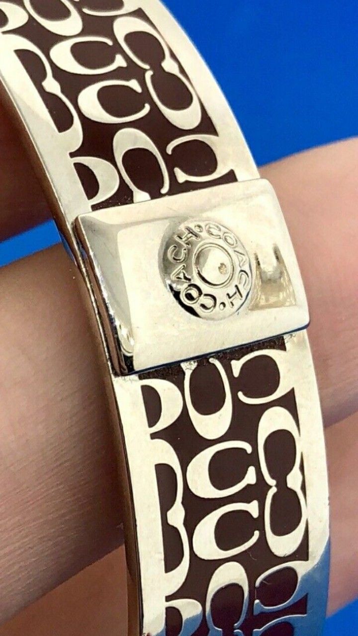 Authentic Coach Bracelet. Silver/Purple W/Burgundy Reflexion