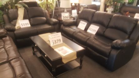 Brand new black or brown bonded leather reclining sofa + loveseat
