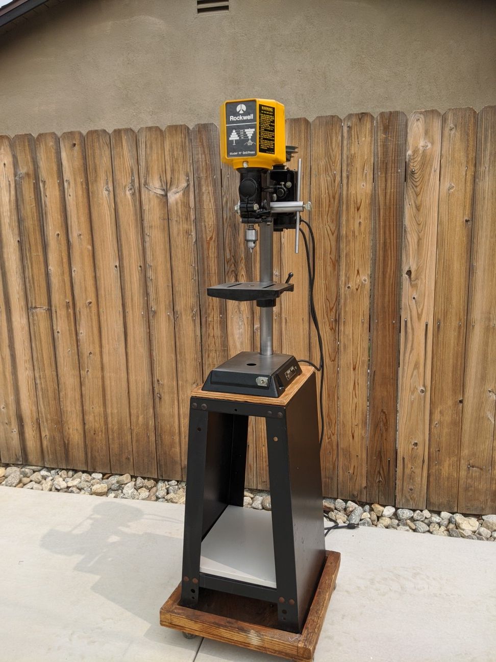 Vintage rockwell 11-10C bench drill press with stand.
