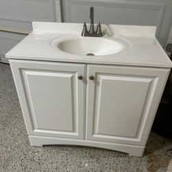 Almost New 36” Glacier Bay Vanity & Hurran Faucet