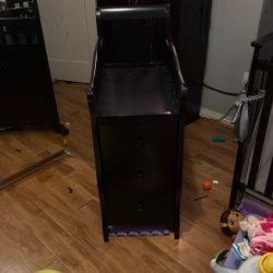 Babies Crib side furniture / diaper change area