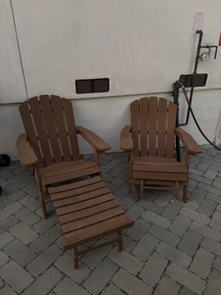 Two Wooden Adirondack Chairs