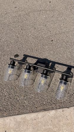 Modern 4-Light Matte Black Bathroom Vanity Light – Clear Glass Shades