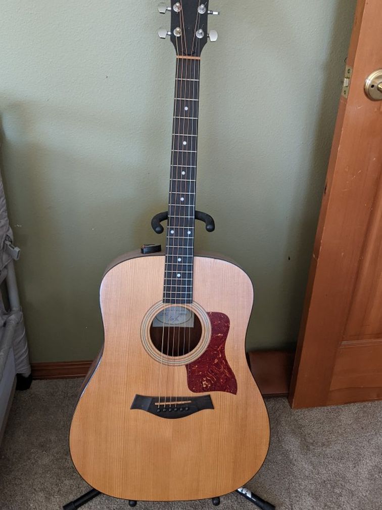 Acoustic Guitar With Stand And Case