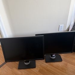 Two Dell Monitors 24 inch screen 