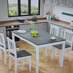 BRAND NEW  Table And 4 Chairs