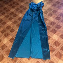 Emerald green slit in the front dress size size large