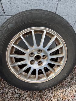 "5 lug Chrysler rims and  tires