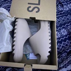 yezzy slides , size 6 but run small so can fit a size 5 , brand new ,  never worn  $300