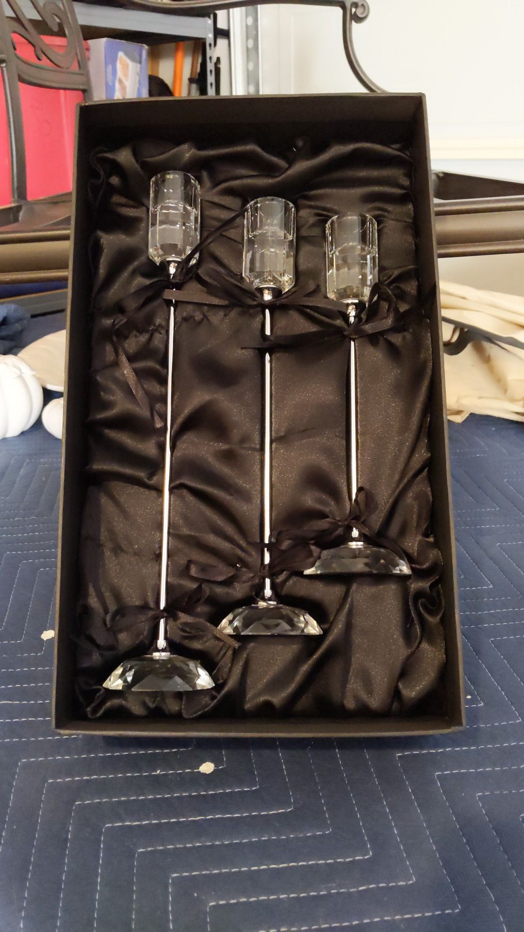 Three tapered Shannon crystal candle sticks