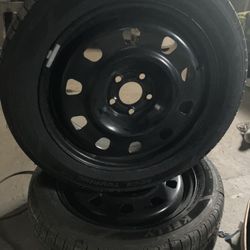 Two New Rims With New Tires 