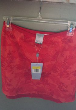 Nike~ sz-s(4/6) burnt orange, dri-fit fabric (transports moisture from your skin to the fabrics surface for rapid evaporation keeping you comfortable