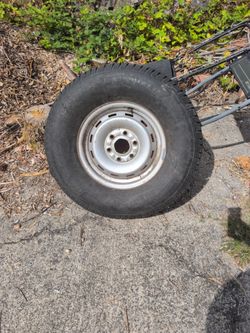 16" 5-Lug Steel Rim w/ Tire - $15