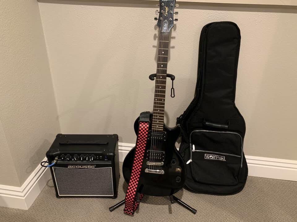 Epiphone special electric youth guitar, stand, soft case and acoustic amplifier set