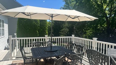 Fortunoff square table and 7 chairs