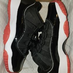 Brand New Air Jordan 11 Retro Low “Bred” – Youth Size 4Y ( NEVER WORN )