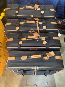 Vintage LOCOMOTOR 4-Piece Rolling Luggage Set – Black & Tan
