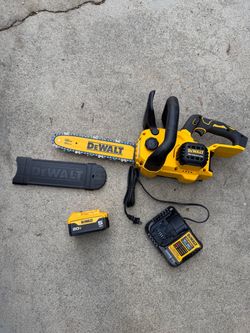 2 dewalt 12 in battery powered chainsaws