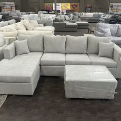New Grey Sectional And Ottoman 